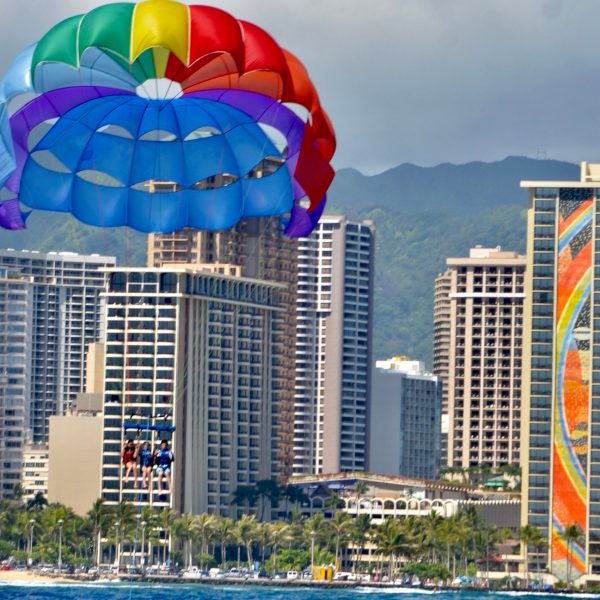 a large body of water with a city in the background