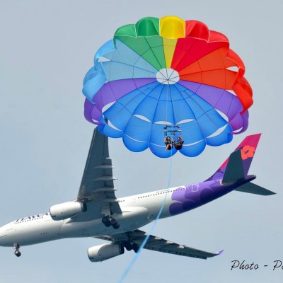 a large air plane on an umbrella