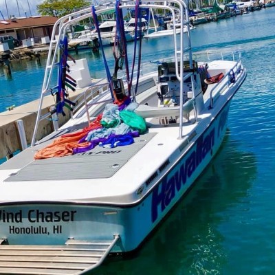 a boat is docked next to a body of water